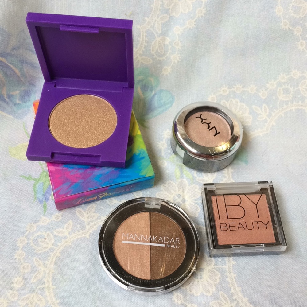 Unused eye shadow, bronzer and highlighter bundle